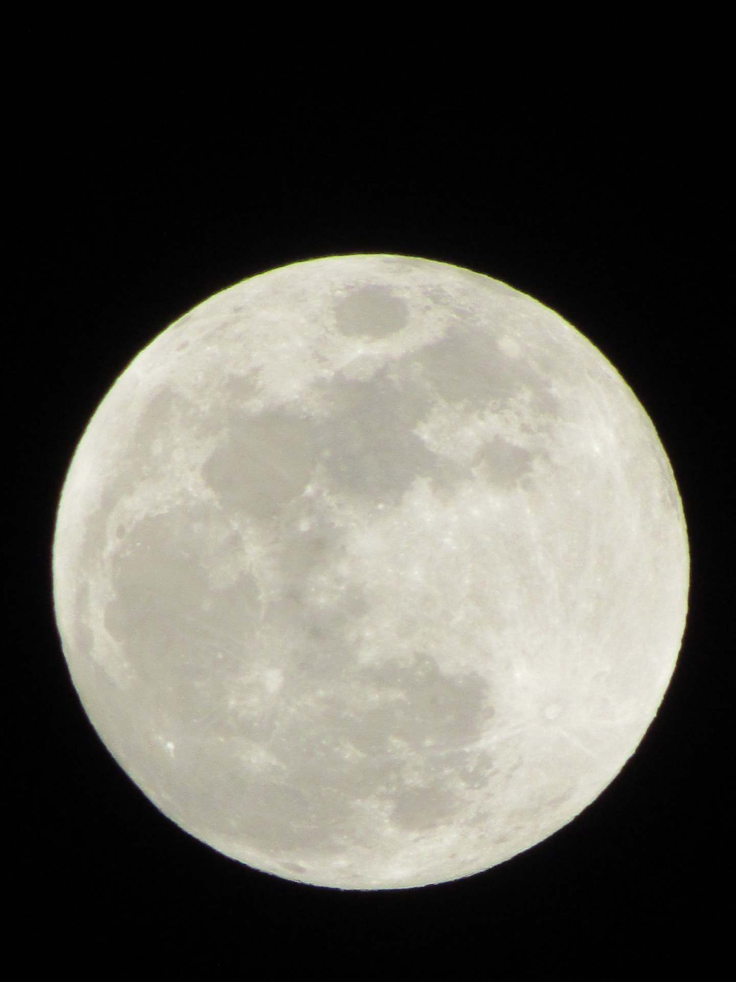 Full moon in sharp detail against a black night sky